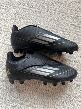 adidas Kids Black Soccer Cleats with Silver & Gold Accents